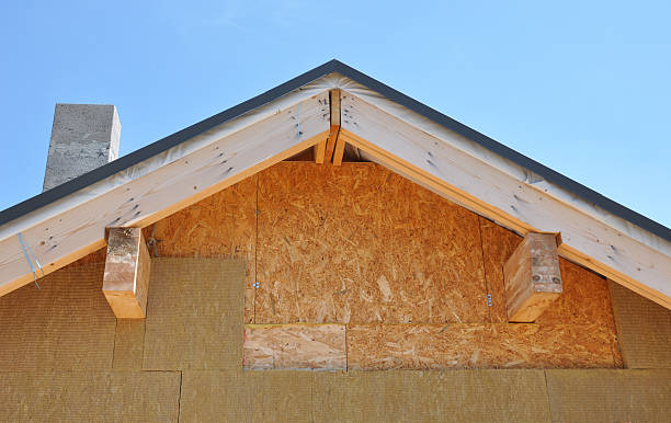 istock Building new house.Attic facade insulation against blue sky 469089836