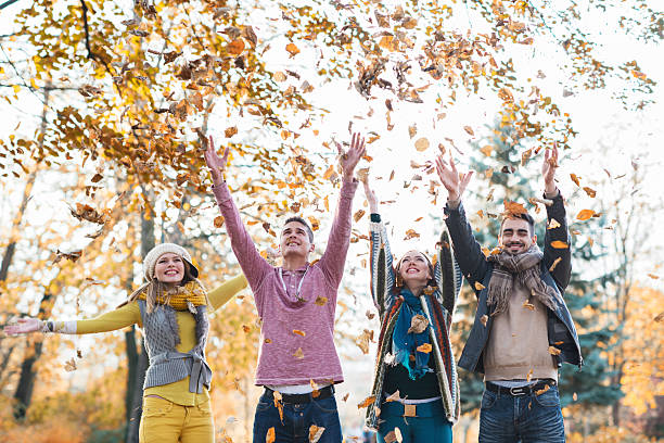 istock Cheerful friends having fun in autumn park. 469089838