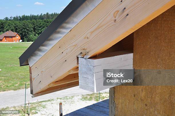 Corner Of New House Under Construction With Eaves Stock Photo - Download Image Now - Construction Frame, Eaves, Half-Timbered