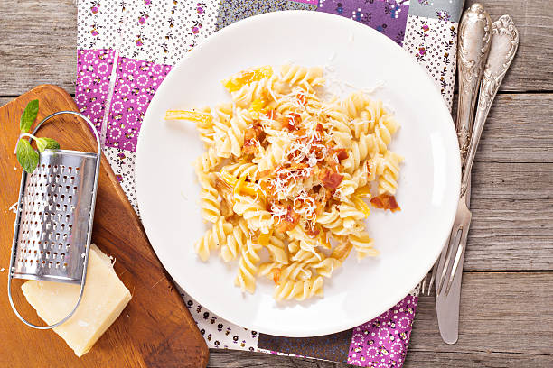 istock Pasta with bacon, bell pepper and cream 469095829