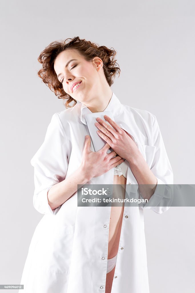 young woman with uniform and her tablet PC 2015 Stock Photo