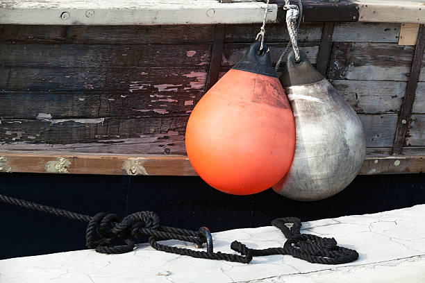 istock Rubber buoys for protecting moored yachts in marina 469096964