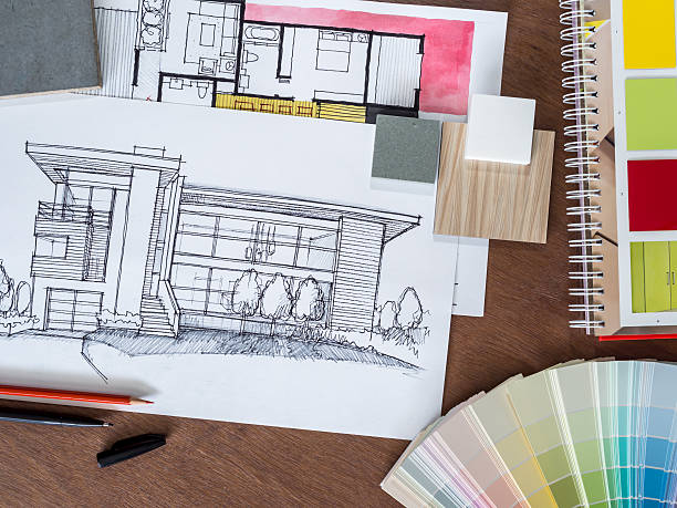 istock Top view of architecture hand-drawn sketch, material on creative workspace 469097544
