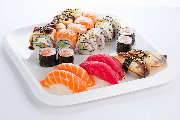 istock Sushi set on white plate over white background 469097756