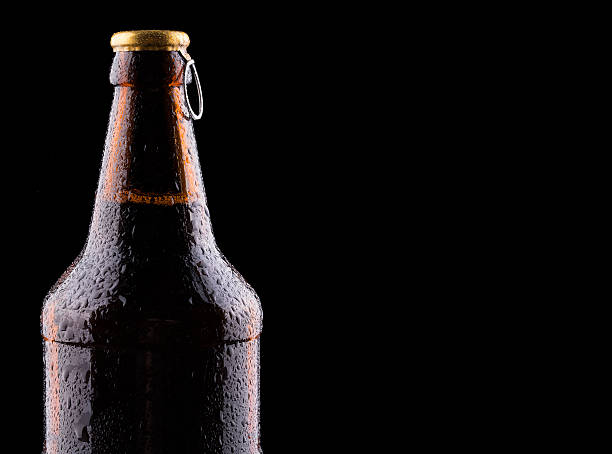 istock Bottle of beer with drops 469098695
