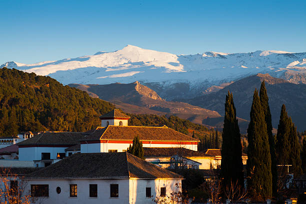 istock Granada in evening with Sierra Nevada in  background 469100212