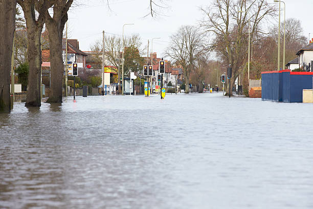 istock Flooded Urban Road With Traffic Lights 469102242