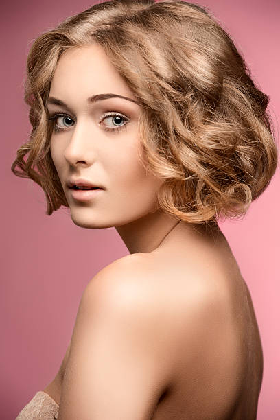 istock curly woman with bob hair-cut 469106184