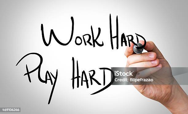 Work Hard Play Hard Written On The Wipe Board Stock Photo - Download Image Now - Playful, Playing, Toughness