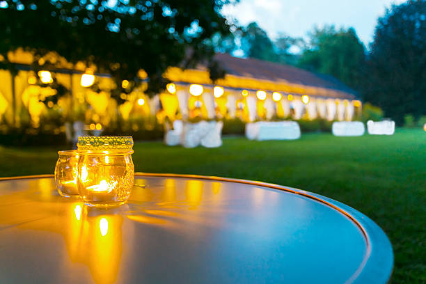dinner wedding reception outdoor outdoor table setting at wedding reception entertainment tent stock pictures, royalty-free photos & images