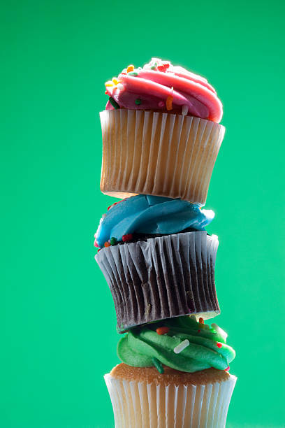 istock colorful stacked cupcakes with butter cream 469110040