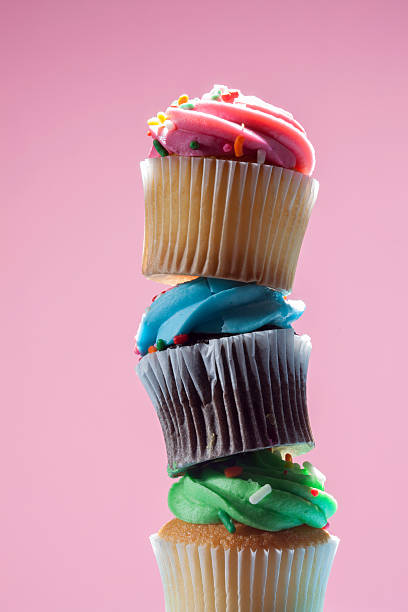 istock colorful stacked cupcakes with butter cream 469110044