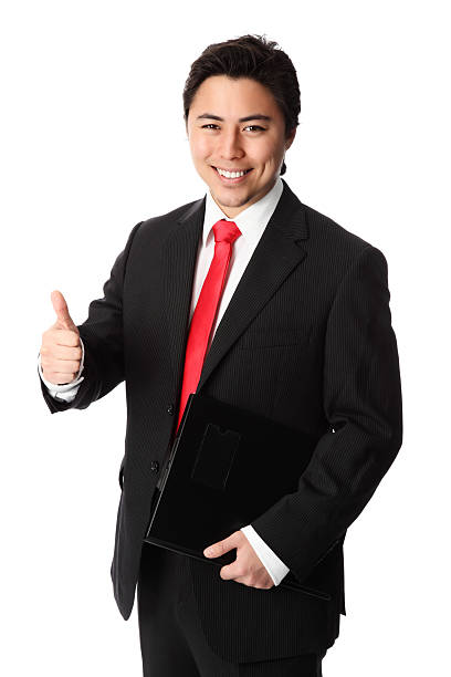 istock A business man with his thumbs up 469110201