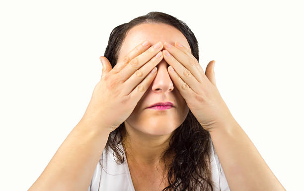 I do not want to look woman who does not want to see what happens in your environment with white background hair covering eyes stock pictures, royalty-free photos & images