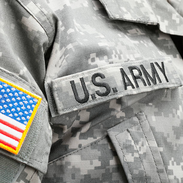 istock USA flag and U.S. Army patch on solder's uniform 469120278