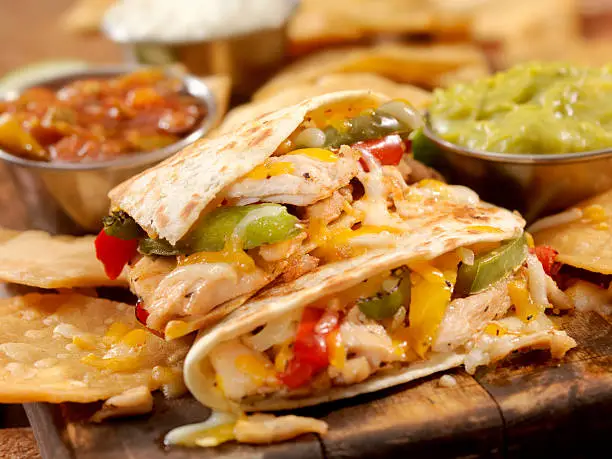 Chicken quesadilla with Roasted Peppers, Cheddar Cheese and all the toppings - Photographed on Hasselblad H3D2-39mb Camera