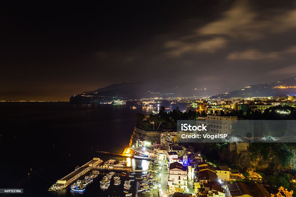 Night scene of Sorrento Night scene of Sorrento, the pier with lots of yachts, a corner of the cityscape on a summer night, Amalfi coast, Italy 2015 Stock Photo