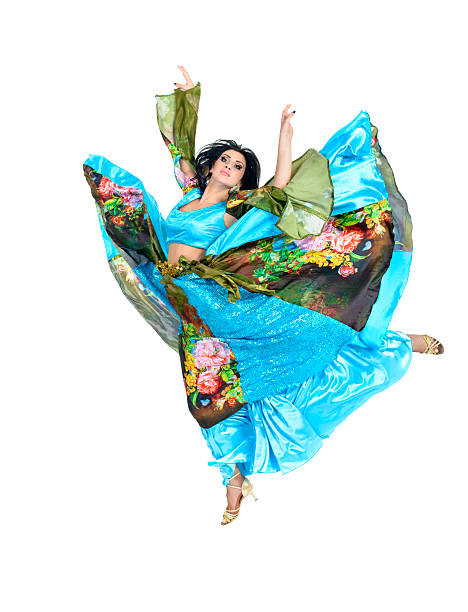 istock gypsy woman jumping against isolated white background 469123418