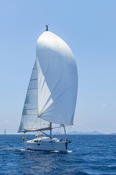 istock Sailing. Ship yachts with white sails in the open Sea. 469124576
