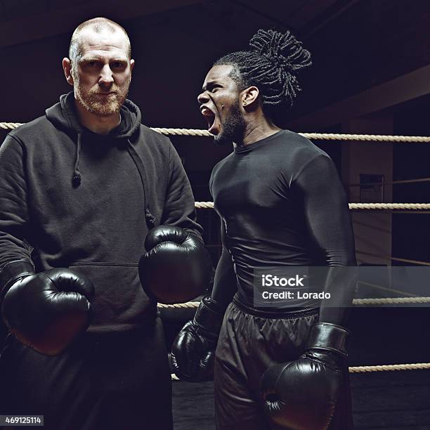 Angry Black Boxer Shouting At His Opponent Stock Photo - Download Image Now - Coach, Shouting, Gym