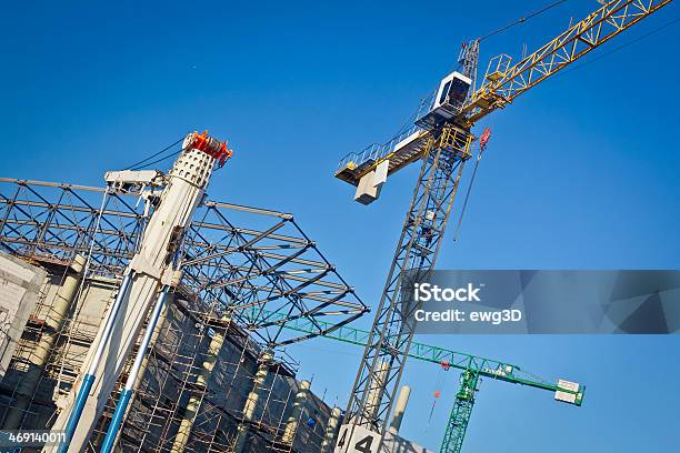 Cranes And Steel Roof Structure Against Blue Sky Stock Photo - Download Image Now - Blue, Building - Activity, Built Structure