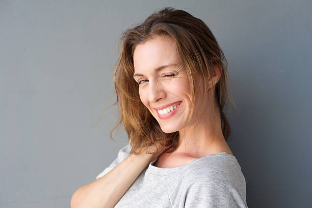 istock Beautiful woman winking her eye and flirting 469142484