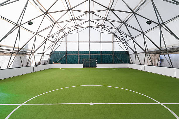 istock Indoor football practice facility 469144156
