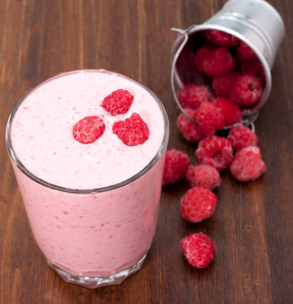 istock Cocktail of frozen raspberries   with yogurt . 469144367