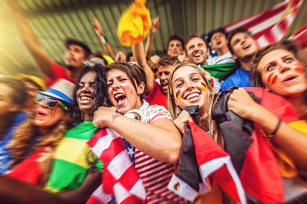 istock Group of different nations supporters together 469145271