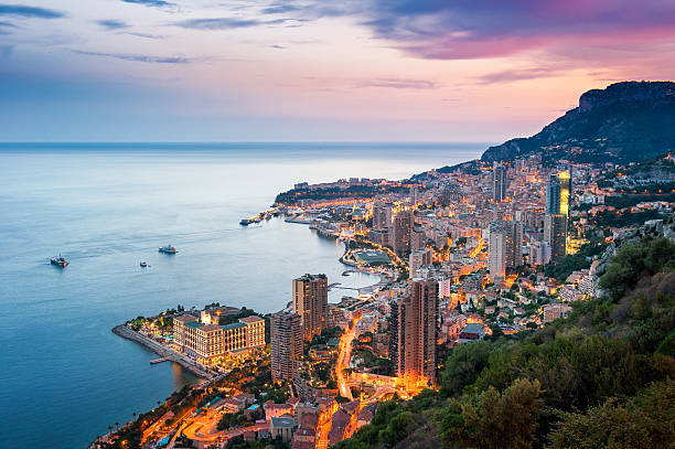 sonnenuntergang auf monte carlo, monaco  - travel nautical vessel commercial dock pier stock-fotos und bilder