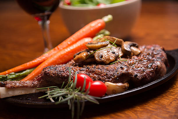 istock Rib Eye Steak with Mushrooms 469151593
