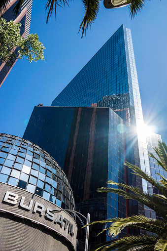 Mexico City, Mexico - February 28, 2015:  The Mexican Stock Exchange in downtown Mexico City on a sunny day with flare from the sun.