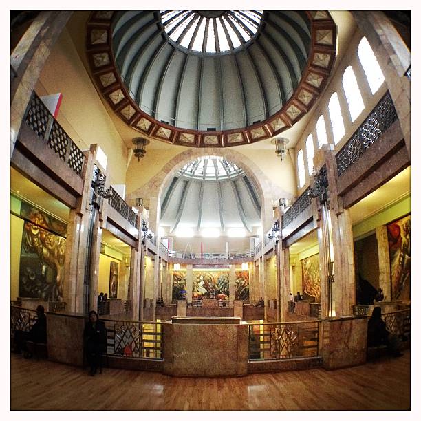 Mexico City, Mexico - February 12, 2015: The first floor and cuppola of the Palacio de Bellas Artes. Mexico City's main opera and theater house. A extravagant marble neoclassical structure inaugurated in 1934.