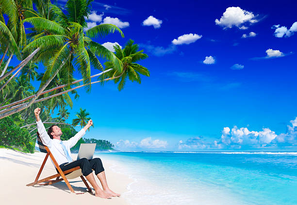 istock Businessman Relaxation Vacation Working Outdoors Beach Concept 469159360