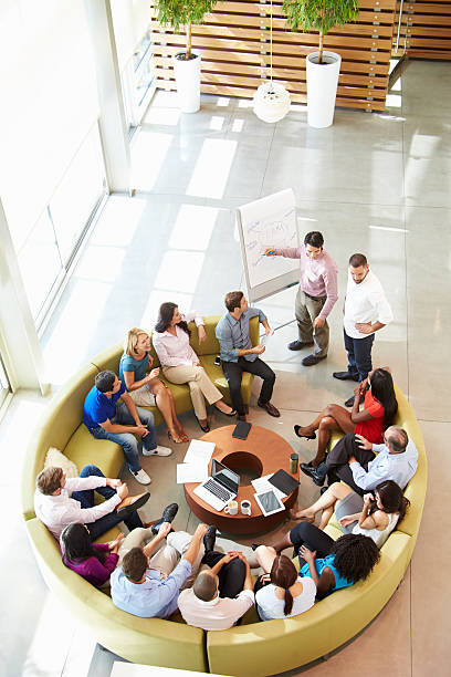istock A businessman conducting a presentation to his colleagues 469160701