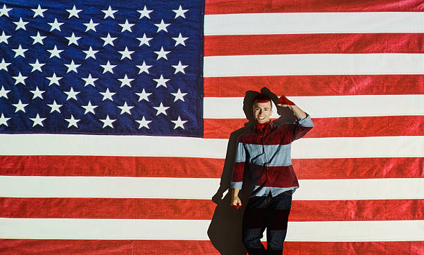 istock Smiling man in front of American flag 469163368