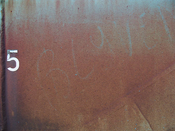 istock rusty metal surface with blue and white number 5 469163920