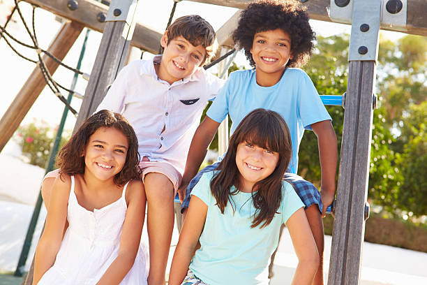 istock Group Of Children On Playground Climbing Frame 469171468