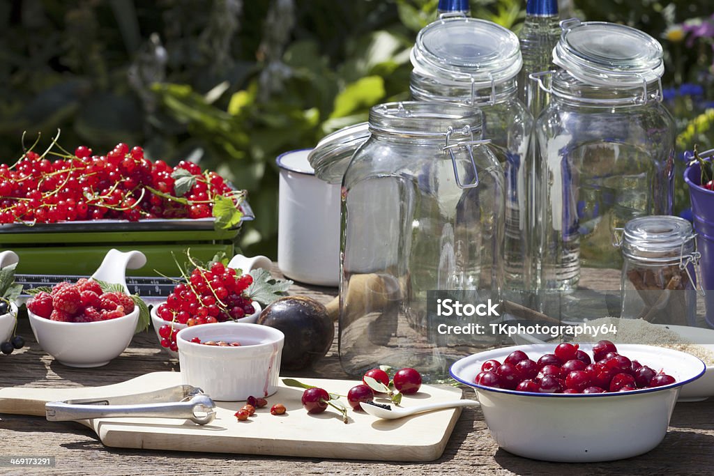 Cherry liqueur preparation, step 3 Cherry liqueur preparation, step 3, remove the seeds Alcohol - Drink Stock Photo