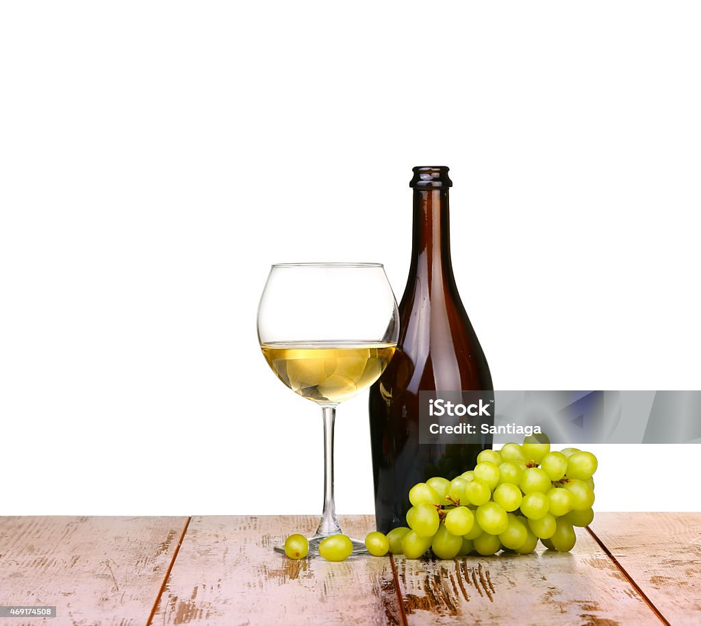 glass of red wine, a bottle of wine and grapes glass of red wine, a bottle of wine and grapes apple on board isolated on white background 2015 Stock Photo