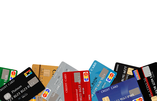 Colorful stack of credit cards on white background