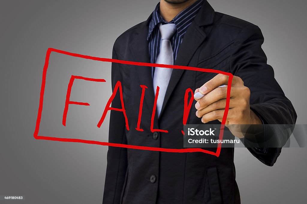 Writing a message that failed by businessman. Accidents and Disasters Stock Photo