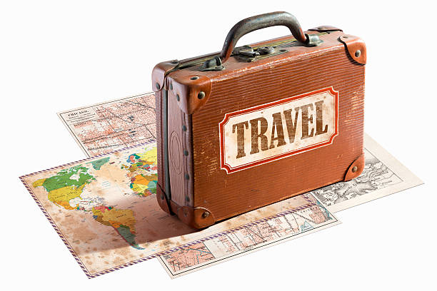 istock Antique leather suitcase on different maps with word travel 469181713