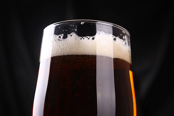 istock Glass of amber ale 469182100