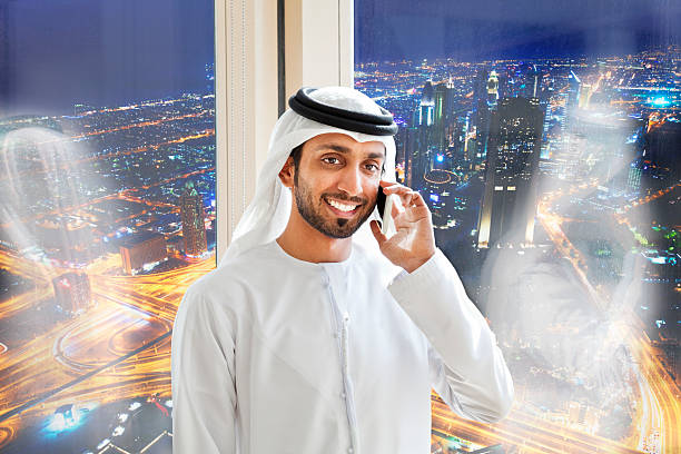 istock Arab businessman answering mobile phone. 469182922