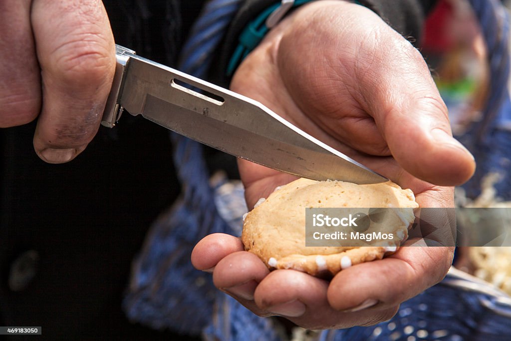 Knife slicing cakes 2015 Stock Photo