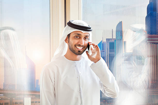 istock Arab businessman answering mobile phone. 469183052