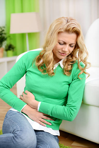 istock blonde woman in home interior 469186191
