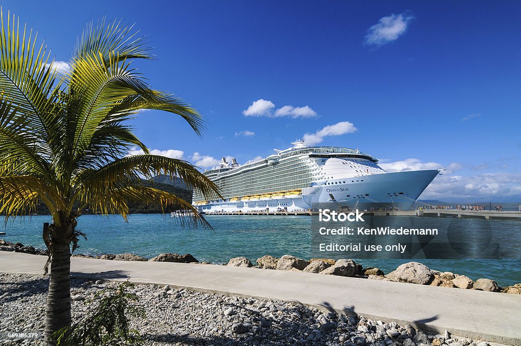 Oasis of the Seas in Haiti Labadee, Haiti-February 3, 2014: Passengers disembark the Royal Caribbean Cruise ship the Oasis of the Seas for a day of beach activities.  With a passenger capacity of over six thousand, the Oasis of the Seas is the largest cruise ship in the world to date. Labadee Stock Photo