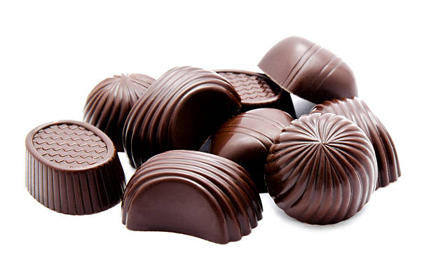 istock Assortment of chocolate candies isolated on a white 469187670